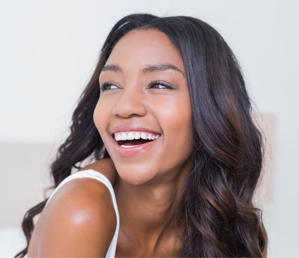 young woman smiling with straight teeth